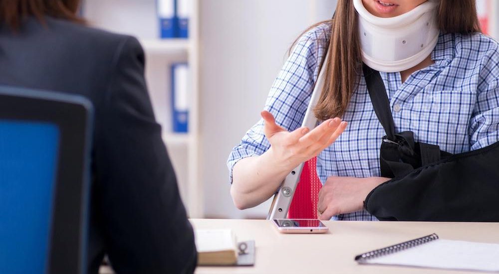 injured employee talking to her employer